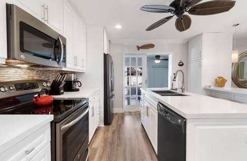 Dania Beach House | TIKI Retreat! Pool/game room! 5min to FLL and BEACH!