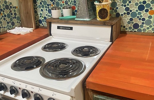 Athens Cottage | Tin Roof Rusted tiny house -2.5 miles to downtown, quite, secluded and private!