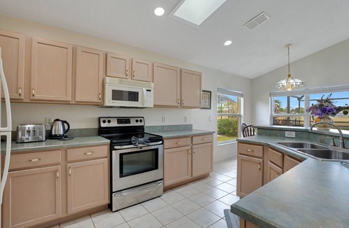 Windsor Palms Villa | *Tinkerbells Castle 1* Private Pool & Spa Overlooking Lake & Disney Fire Works