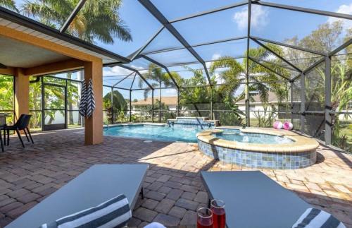 Diplomat House | Tranquil Palms Heated Pool Spa Outdoor TV & More