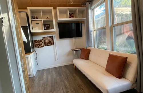 Orange City House | Tranquil Tiny Retreat: Escape to Rural Suburbia's Hidden Gem!