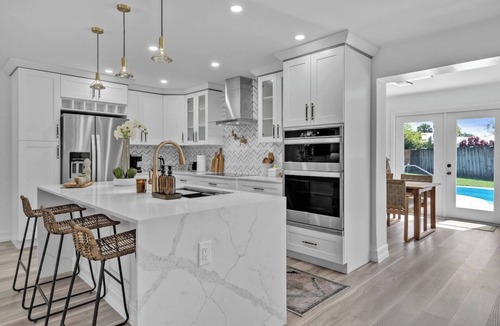 Florida North Atlantic Coast House | Tres Palmas · Luxury 4BR Oasis: Pool, Hot Tub, Beach & Golf!