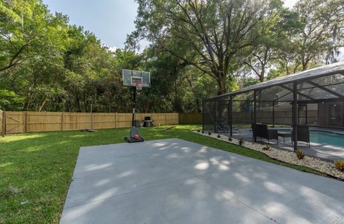 Temple Terrace House | Tropical Luxury Escape with Backyard Oasis & Pool