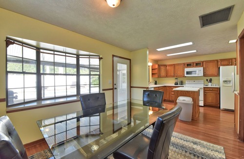 Fort King District House | Tropical Pool Home in SE Ocala! Air Hockey, Foosball, Brand New Kitchen & Floors