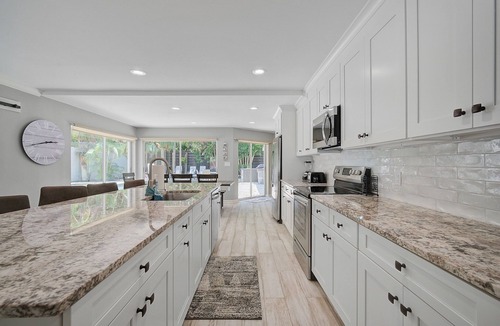 Bay Isle House | Tropical Siesta Key Home with Incredible Pool, Hot Tub, and Patio!
