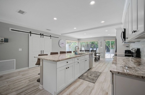 Bay Isle House | Tropical Siesta Key Home with Incredible Pool, Hot Tub, and Patio!
