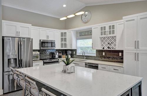Lake Ida Shores House | Tropical, tranquil
