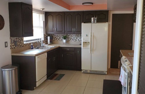 Venice Gardens House | Tropical vacation house with large, heated pool and spacious, open floor plan