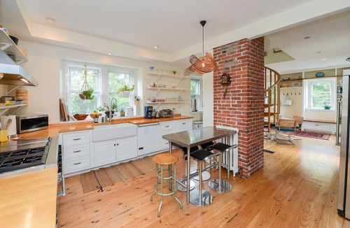 East Mount Airy Villa | Tudor Mansion With Outdoor Oasis and Swimming Pool