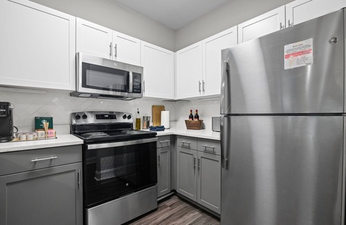 Old Fourth Ward Condo | Two FIFA World Cup Suites · Sleeps 8 · Rooftop Pool · Private Balconies