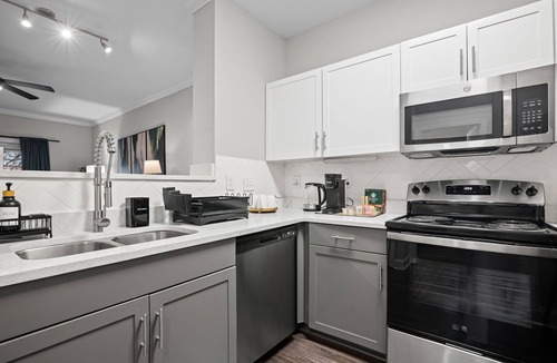 Old Fourth Ward Condo | Two FIFA World Cup Suites · Sleeps 8 · Rooftop Pool · Private Balconies