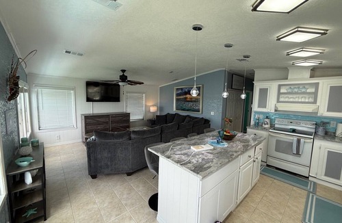 Cudjoe Key House | TWO HOMES A MID Rise and High Rise 85ft of Sea Wall.