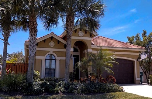 Naples Park House | Two Master Bedrooms! Less than 1 Mile to the beach with heated pool and spa