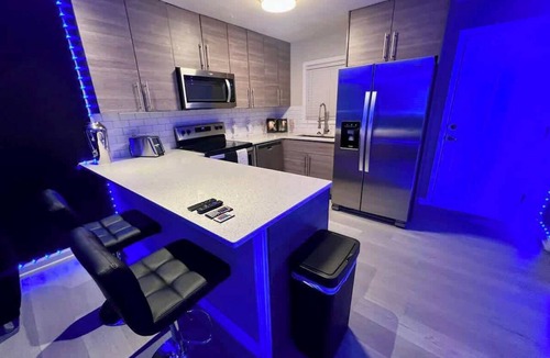 Loring Heights Apartment | Ultra Modern Chrome Heart Haven - Fireplace Bed!