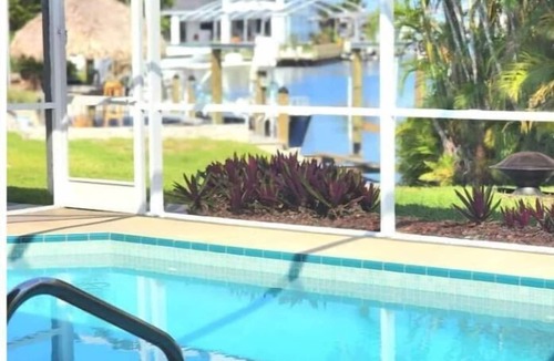 Yacht Club House | Unwind by your private pool watching the sunset over the canal!