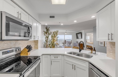 Seawinds Condo Condo | Updated direct oceanfront corner condo with stunning beach views, a heated pool, and parking garage