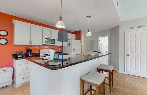 Sea Trail Condo | Updated golf resort condo near beach with pool, tennis/pickleball & private deck