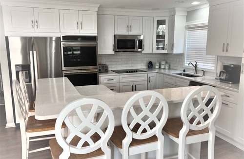 Ocean Isle Beach House | Upscale 6 Bedroom Canal Waterfront, Private Pool, Golf Cart, Kayaks, Bikes- WOW