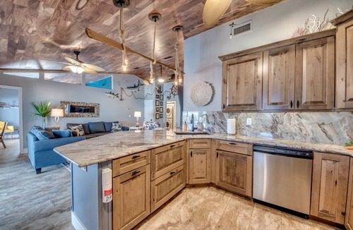 Matlacha Isles Villa | Fun'n Sun-Charming 3 BR/3 baths waterfront villa- pool, spa, dock, fishing poles