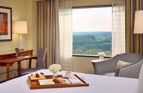 Gwinnett Place House | Vacation Day Is Always A Great Idea! Enjoy Spacious unit and Pool access!