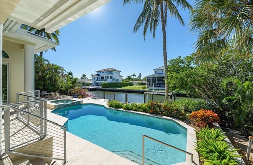 Naples Park Apartment | Vanderbilt Queen - Coastal Retreat w/Pool & Dock - 5 min to Vanderbilt Beach