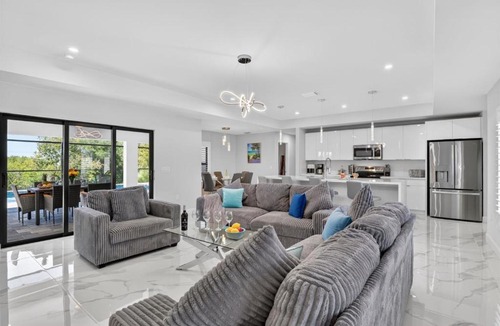 Mariner Villa | Villa Capeside Waterfront Home with Heated Pool & Spa