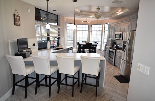 Apollo Beach House | Villa Oasis, w/Heated & Covered Pool, Pool Table, Boat Dock, Gym and much more.