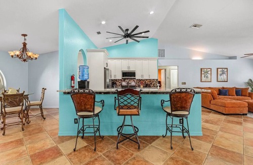 Centennial Villa | Villa Poolside Paradise: Unwind in Tropical Style!