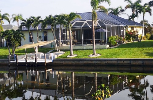 Pelican Villa | VILLA 'THE ARTIST' GULF ACCESS HOME, SOLAR-AND ELECTRIC HEATED POOL