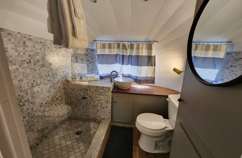Mill Spring House | Vintage 1971 Airstream on the creek, easy access to pool and playground, sleeps 2.