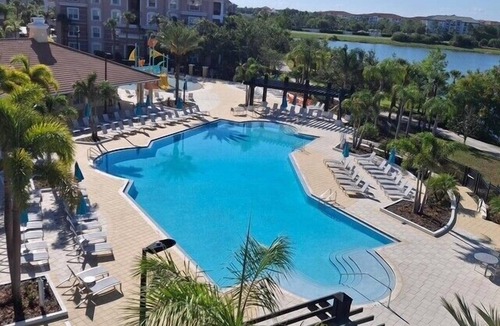Florida Central Atlantic Coast Condo | Vista Cay Lakeview Island Breeze, Walk to Epic Universe and the OCCC