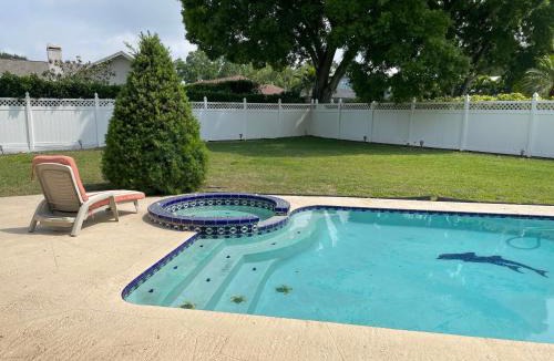 Collins Estates House | Walk to Indian Rocks Beach Exclusive Use of Hot Tub, Pool, BBQ,with Privacy