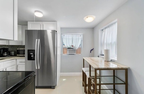 Dolphin Isles Apartment | Walk To The Beach | Fire pit + Pool | Coconut Unit
