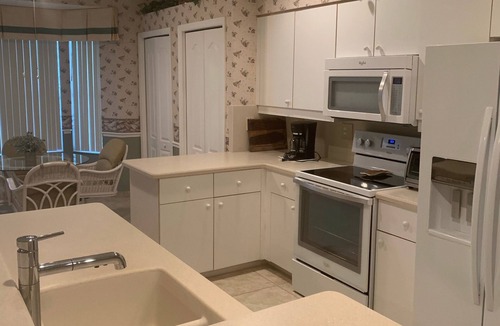 Estero Villa | Water and golf course views in Country Creek!