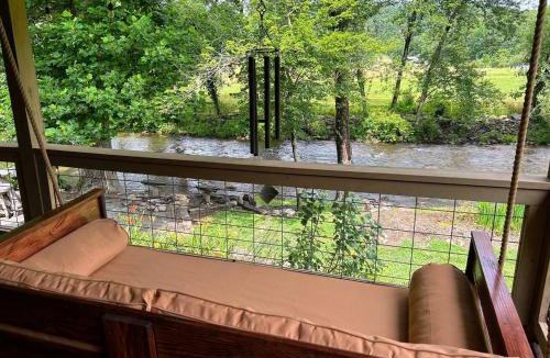 Bryson City House | Water's Edge, Covered Porch, Deep Creek as your Backyard Haven, Hot Tub, Pool Table, Fire Pit, Close to Town & Entrance to National Park