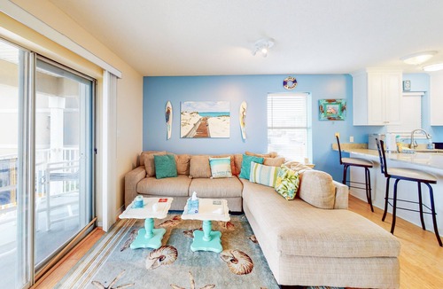 Navarre Beach Condo | Water-view haven with sound-view balcony, shared pool, WiFi, and AC