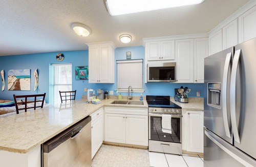 Navarre Beach Condo | Water-view haven with sound-view balcony, shared pool, WiFi, and AC