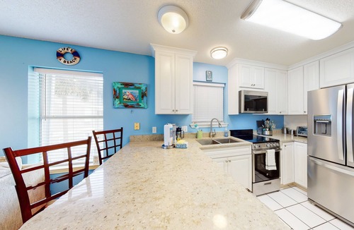 Navarre Beach Condo | Water-view haven with sound-view balcony, shared pool, WiFi, and AC