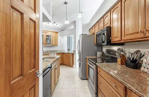 Pelican House | Waterfall saltwater Lagoon heated pool, 2 King Suites, Sauna!