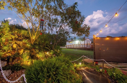Sugarmill Woods Cabin | Waterfall Suite at Zen at the Palms with a Private Hot Tub by the Waterfall!