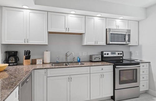 Marco Island Condo | Waterfront 2BR, 2BA condo with heated pool, WiFi, and marina access.