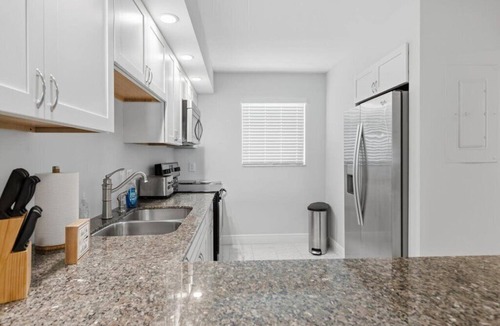 Marco Island Condo | Waterfront 2BR, 2BA condo with heated pool, WiFi, and marina access.