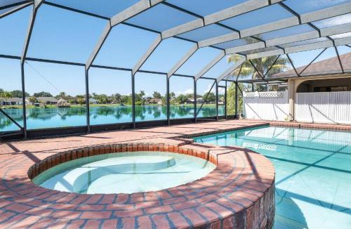Tamarac House | Waterfront 5BR Home with Game room Pool Sleeps 10
