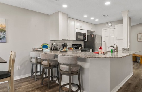 Gulf Lagoon Beach Condo | Waterfront boat dock,very close to beach, pool, tennis courts, and sauna.