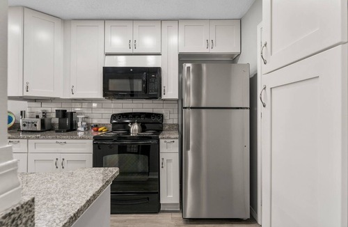 Gulf Lagoon Beach Condo | Waterfront boat dock,very close to beach, pool, tennis courts, and sauna.