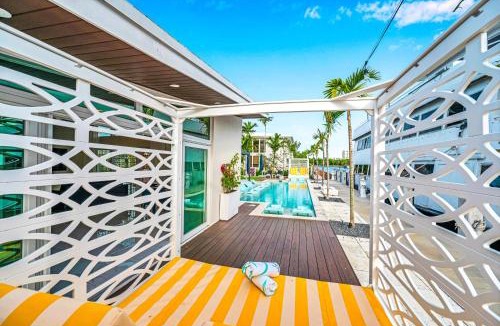 Coral Ridge Villa | Waterfront Compound 2 Heated Pools SaltAire Lime Keys