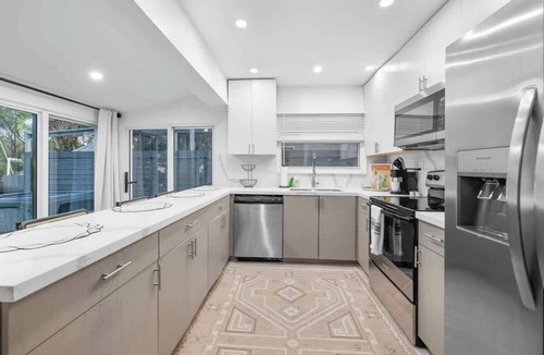 Melaleuca Gardens House | Waterfront Duplex Tropical Oasis