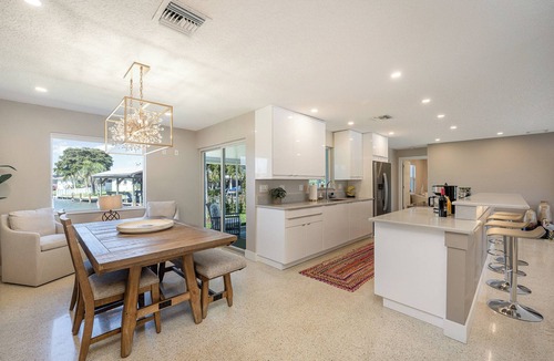 Venetian Way House | Waterfront Gem Stunning Sunsets & Wildlife Views Boat Dock Mins to Beach