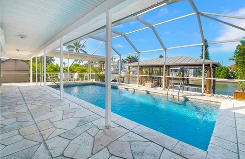 Isles of Capri House | Waterfront - Gulf Access - Pool - Boat dock - kayak - Golf cart - Bicycles
