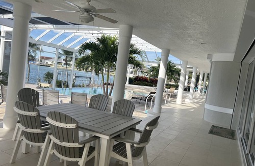 Marco Island House | Waterfront home on Marco Island, large pool, & dock. Sleeps 18, many amenities.